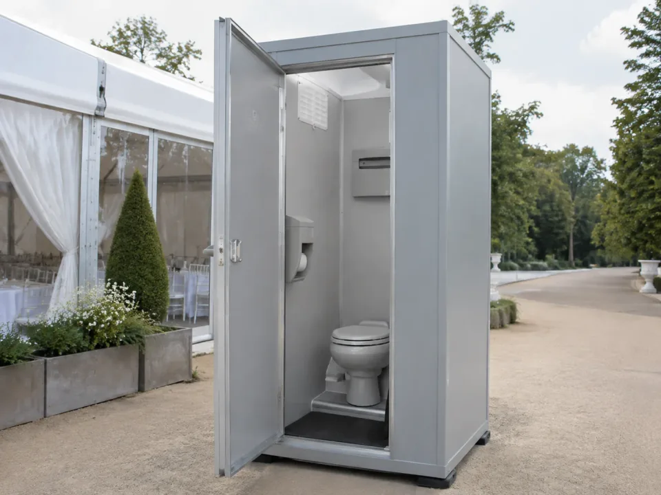 Baño VIP portátil gris con sanitario interior para eventos